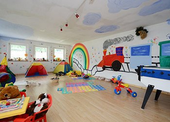 Apartment in Canazei. Playing room for children.