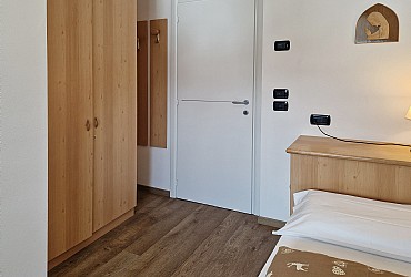 Wohnung - Soraga di Fassa. Einzelzimmer. Ausgestattet mit großer Terrasse und wunderbarem Blick auf die Rosengartengruppe.