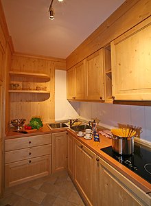 Appartamento a Canazei. Confortevole soggiorno per allietare le vostre serate in montagna, con 