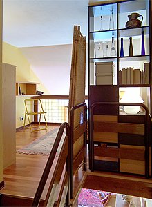 Francesca Emiliani - entry of the loft with screen for the nighttime privacy. the loft is equipped with a thick curtain for the night