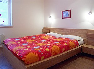 Appartamento a Penia di Canazei. La seconda camera dispone anch'essa di letto matrimoniale.