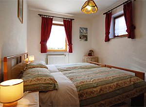 Apartment in San Giovanni di Fassa - Vigo. double bedroom with possible third bed.