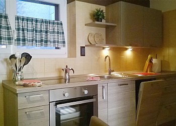 Apartment in San Giovanni di Fassa - Pera. Kitchen equipped for a comfortable stay.
