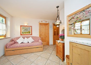 Apartment in Canazei. Threerooms 60 sqm. Resa ladina livingroom with kitchen area and sofa-bed (lattex madrasse is like one normal bed hight comfort)
