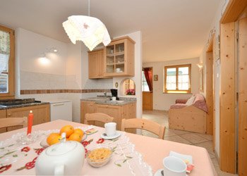Apartment in Canazei. Apartment Threerooms Resa ladina
Livingroom with kitchen area