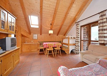 Apartment in Canazei. Livingroom with SAT TV and Internet WI-FI.