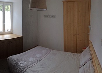 Apartment in Moena. Duoble bedroom.