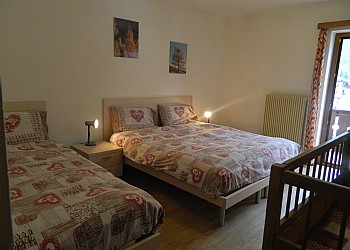 Apartment in Canazei. large room with double bed , 1 single and cot