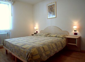 Residences in Campitello di Fassa. Bedroom of apartment nr. 2