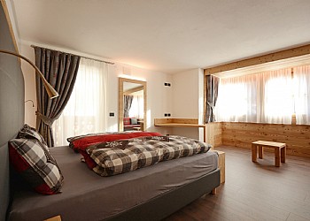 Appartamento a Campitello di Fassa. Camera da letto con possibilità di terzo letto.