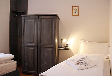 Wohnung - Moena. Schlafzimmer mit zwei Betten.