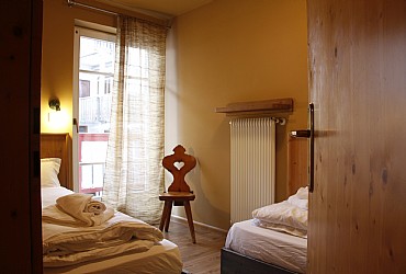 Wohnung - Moena. Schlafzimmer mit 2 Betten.