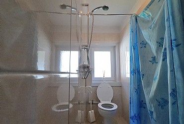 Apartment in Canazei. Small bathroom with shower.
