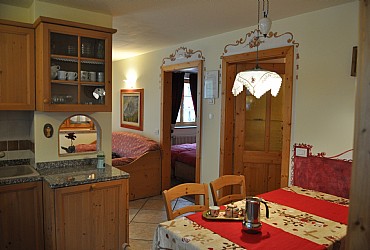 Apartment in Canazei. Livingroom with kitchen area