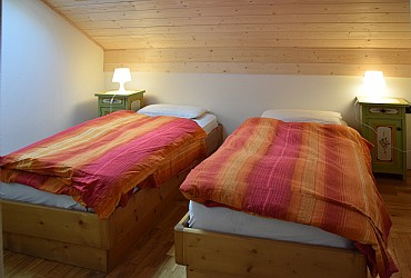 Appartamento a Campitello di Fassa. Prima camera a due letti con velux