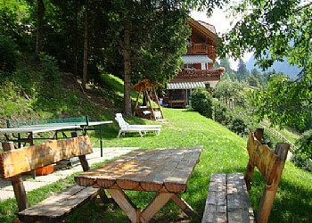 Appartamento a Predazzo. Giardino.